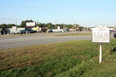 P.T. Barnum Marker. looking north at N Wesleyan Blvd. (US 301 Bypass) and Airport Road image. Click for full size.