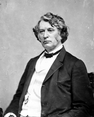 Charles Sumner, half-length portrait, seated, facing slightly left image. Click for full size.