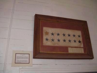 Flag on Display on Back Wall of Schoolhouse image. Click for full size.