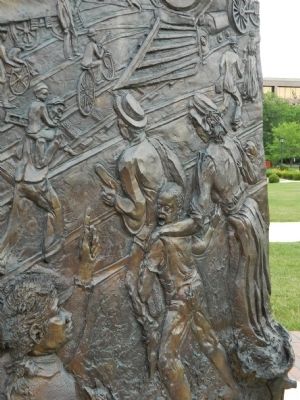 Acts of Intolerance Sculpture Detail image. Click for full size.