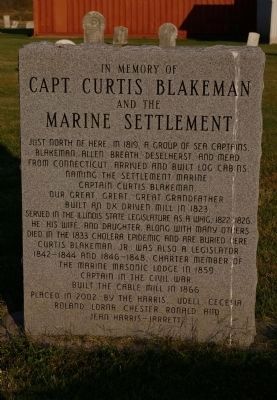 Capt. Curtis Blakeman and the Marine Settlement Memorial image. Click for full size.