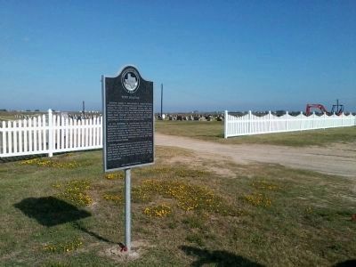 Marker sits just outside the Port Bolivar cemetery image. Click for full size.