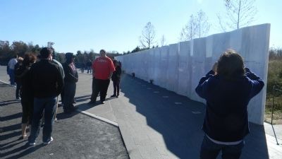Flight 93 Memorial Wall - marking the course of the airliner over the crash site image. Click for full size.