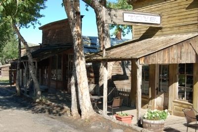Strasburger�s Colorado Store, on left in the shade. image. Click for full size.