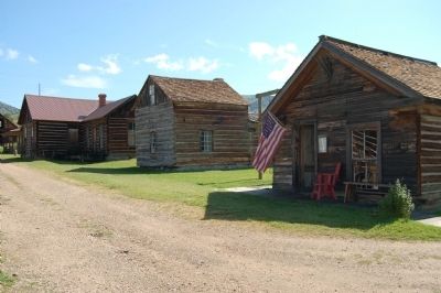 Montana’s Oldest Standing School and Marker, on the right. image. Click for full size.