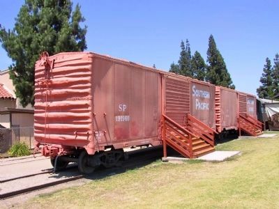 Railroad Cars on Display Near the Depot Building image. Click for full size.