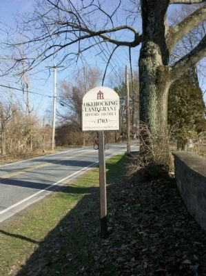 Okehocking Land Grant Marker next to cemetery wall image. Click for full size.