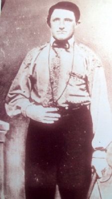 Photo of Dick Williams on Wagonmaster's House Marker image. Click for full size.