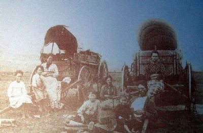 Emigrant Family on Westport - Santa Fe Trail - Oregon / California Trail Marker. Click for full size. Emigrant Family on Westport - Santa Fe Trail - Oregon / California Trail Marker image. Click for full size.
