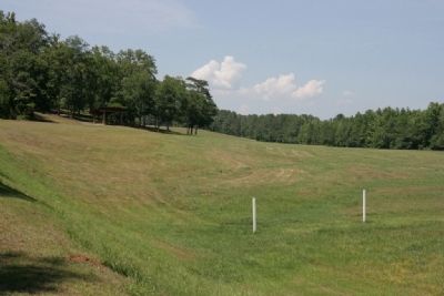 From the log barricade position, the gun placement is to the left behind the tree line. image. Click for full size.