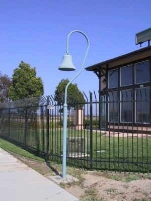 El Camino Real Bell in Front of the Railcar Plaza image. Click for full size.