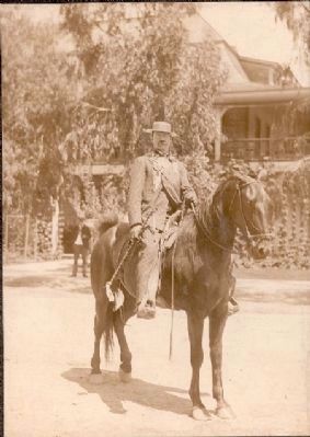 Rider in front of the Maywood Hotel image. Click for full size.