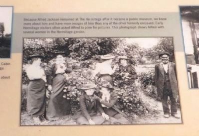 Alfred with several women in the Hermitage garden. image. Click for full size.