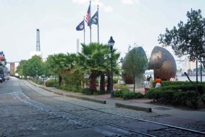 "A World Apart" Marker and Park along W River Street image. Click for full size.
