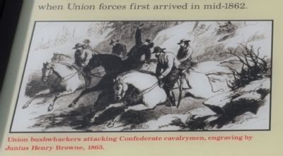 Union bushwhackers attacking Confederate cavalrymen, image. Click for full size.