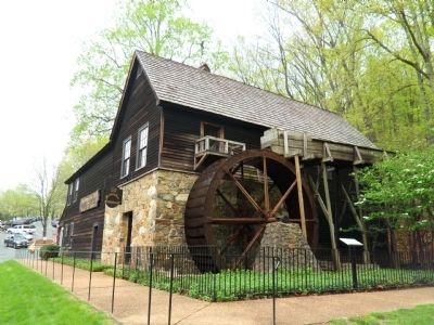 The Meadow Run Grist Mill Marker to the right. image. Click for full size.