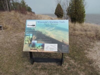 Marker and Lake Michigan shoreline. image. Click for full size.