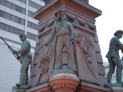 Left Obverse Statue image. Click for full size.