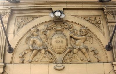 Ornamentation above the corner entrance. Click for full size. Ornamentation above the corner entrance image. Click for full size.