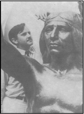 William Gordon Huff putting finishing touches on his bronze statue of Chief Solano image. Click for full size.