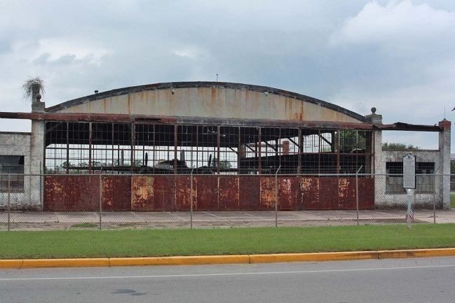 Curtiss-Wright Hangar with a B-25, nose first and Marker, at right, 2012 image. Click for full size.