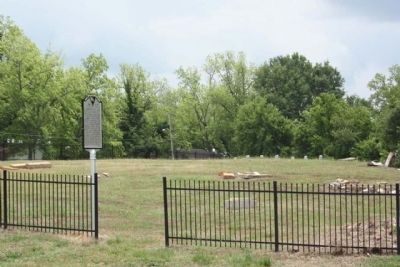 Newberry Village Cemetery Marker at entrance with Military Headstones in far background image. Click for full size.