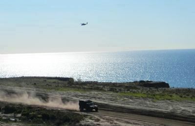Marines in training with truck and heliocpter on the beach west of the bell marker. Click for full size. Marines in training with truck and heliocpter on the beach west of the bell marker image. Click for full size.
