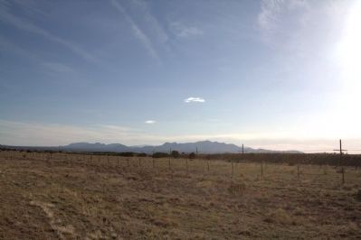 View of the Southern Rockies from Route 41 in the Galisteo Basin. Click for full size. View of the Southern Rockies from Route 41 in the Galisteo Basin image. Click for full size.