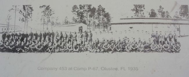 Left photo - Company 453 at Camp P-67 image. Click for full size.