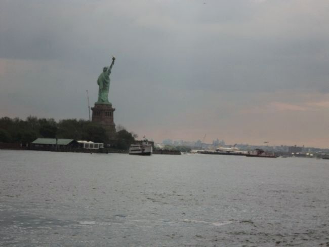 Enterprise Passes Liberty Island image. Click for full size.