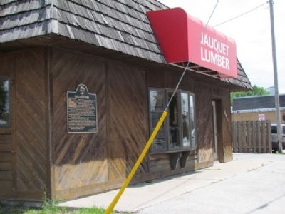 Bellevue Park Marker and Jauquet Lumber Building image. Click for full size.