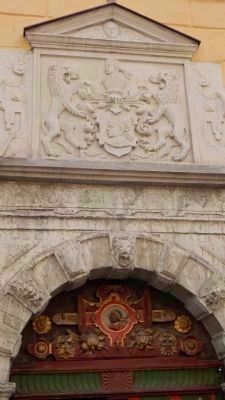 Coats of arms at entrance to <i>Mustpeade Maja</i> featuring images (above & below) image. Click for full size.