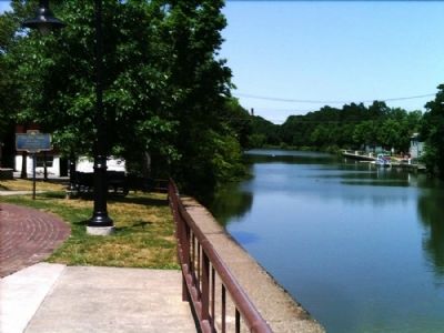 Old Erie Canal Marker as seen facing west from just north of the gazebo. Click for full size. Old Erie Canal Marker as seen facing west from just north of the gazebo image. Click for full size.