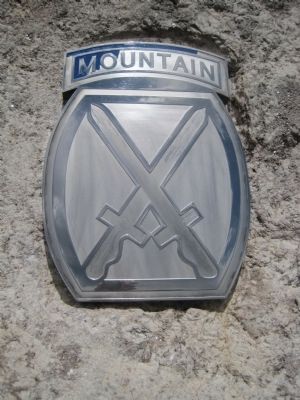 10th Mountain Division symbol on the Soldiers of the Summit Memorial image. Click for full size.