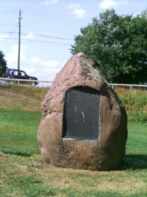 Genesee Castle Marker within it's holder boulder. Click for full size. Genesee Castle Marker within it's holder boulder image. Click for full size.