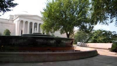 The Memorial Fountain, its brass basin's celebrated Zodiac motif hidden in the shade,. Click for full size. The Memorial Fountain, its brass basin's celebrated Zodiac motif hidden in the shade, image. Click for full size.