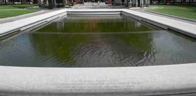 View of the Memorial's reflection pool with the. Click for full size. View of the Memorial's reflection pool with the image. Click for full size.