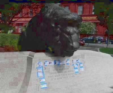 <center>Inscription, northwest corner-with officers' names below one of four guardian lions</cen<br>. Click for full size. <center>Inscription, northwest corner-with officers' names below one of four guardian lions</cen<br> image. Click for full size.