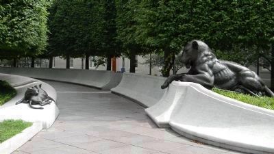 National Law Enforcement Officers Memorial - the east side pathway with a bronze lion (right). Click for full size. National Law Enforcement Officers Memorial - the east side pathway with a bronze lion (right) image. Click for full size.