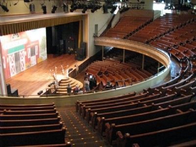 Inside the Ryman, the lower pews and stage image. Click for full size.