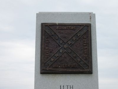 Bronze Flag Atop Monument image. Click for full size.
