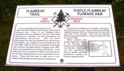 Flambeau Trail – Turtle Flambeau Flowage Dam Marker image. Click for full size.