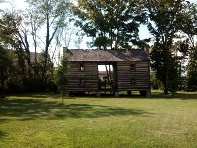 Replica log house. Click for full size. Replica log house image. Click for full size.