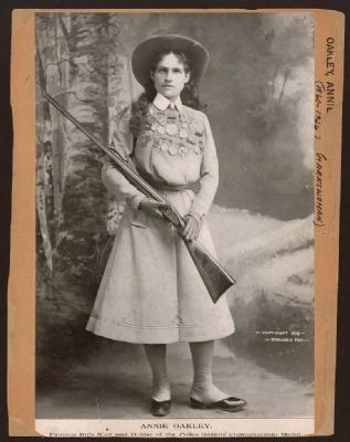 Annie Oakley - famous rifle shot and holder of the Police Gazette championship medal image. Click for full size.
