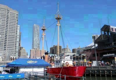 Pier 16 at South Street Seaport with the museum's 1907, ex-Coast Guard Lightship image. Click for full size.