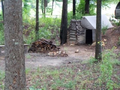 Camp Ford - Early Days as a Prison Camp dugout hut. Click for full size. Camp Ford - Early Days as a Prison Camp dugout hut image. Click for full size.