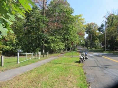 Looking west up Green Street. Goshen, Orange Co., N.Y. marker visible left of crossing. image. Click for full size.