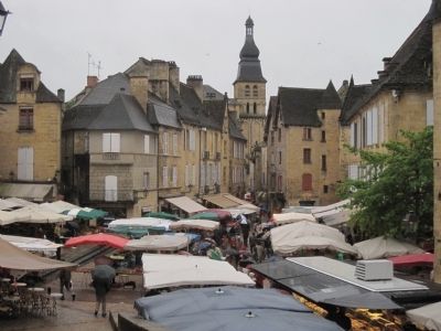 Place de la Liberte on market day. image. Click for full size.