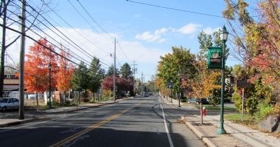 Looking west along Lake Road E. St. Pauls Church Marker visible on right. image. Click for full size.