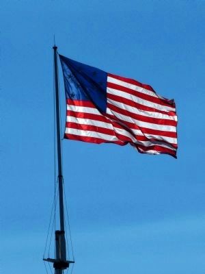 The 17 X 25 foot 15-star 15-stripe storm flag flies o'er the ramparts at Fort McHenry image. Click for full size.